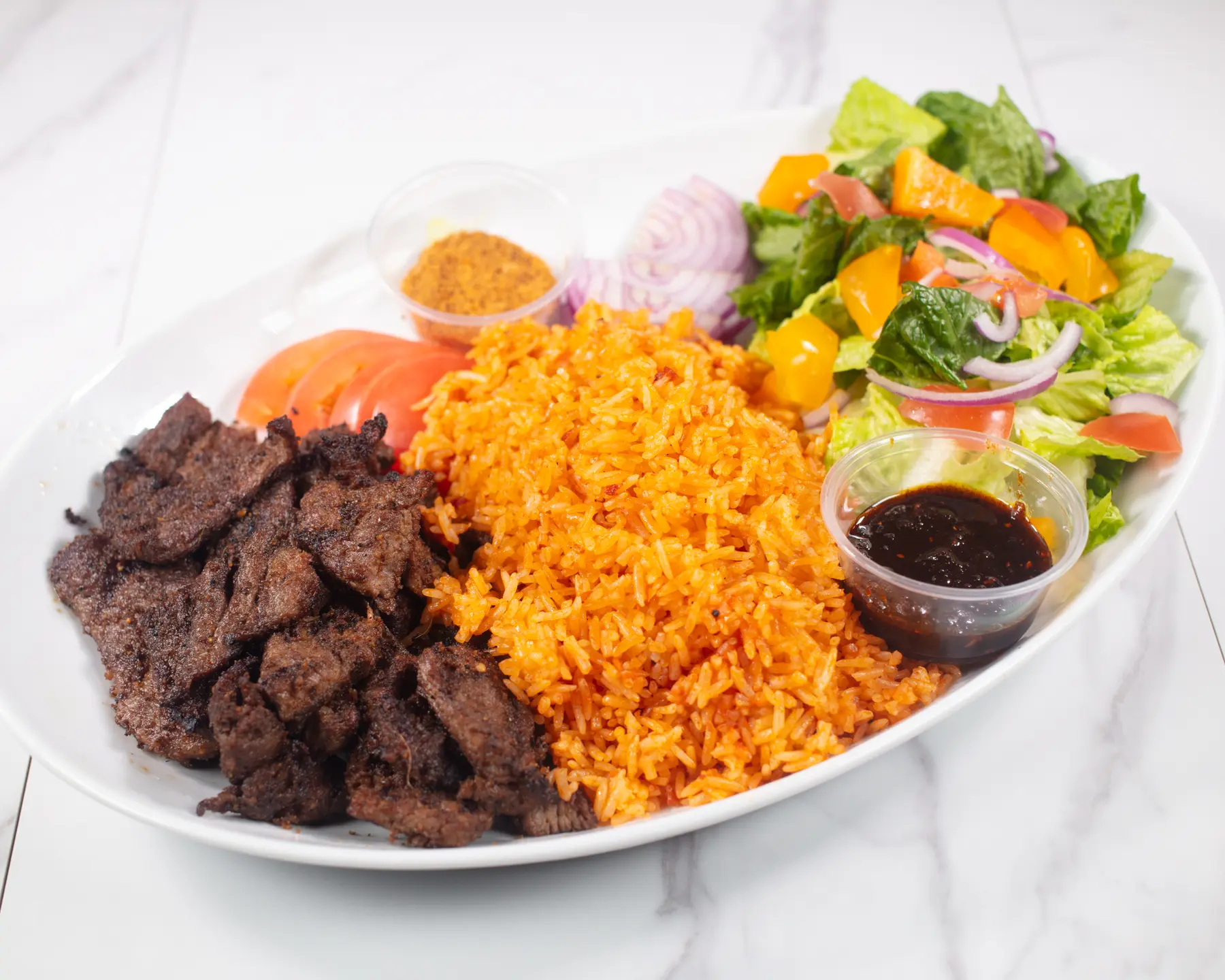 Suya and jollof for group dining at Afro Fusion